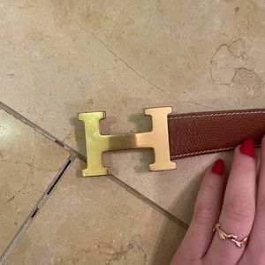 Tan leather belt with gold H